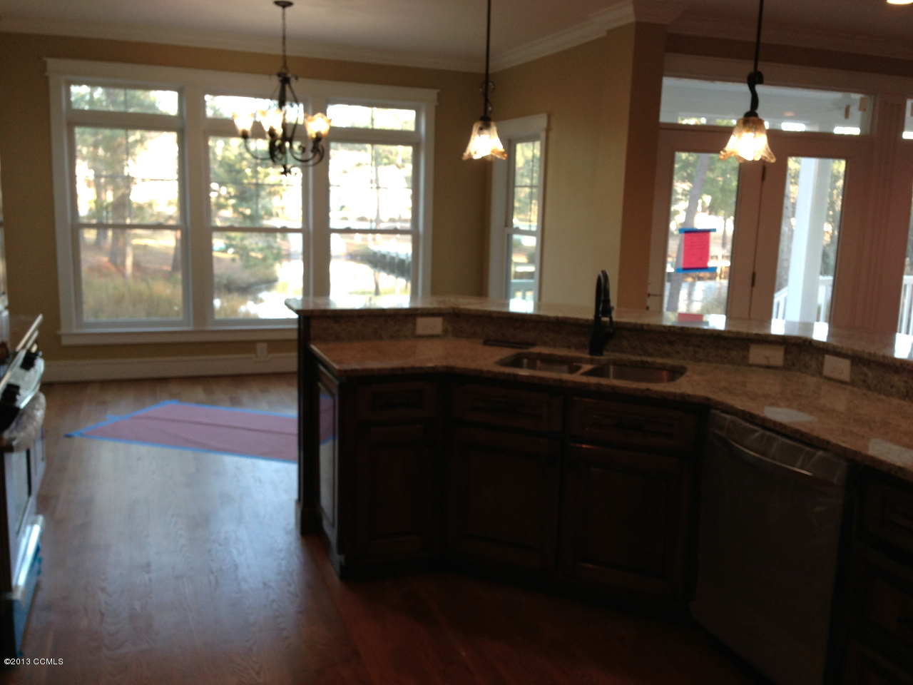 111 Lowery Lane, Unit LT 72 Rockingham, NC 28379 - Photo 9 of 27 view of kitchen and dining w/water view