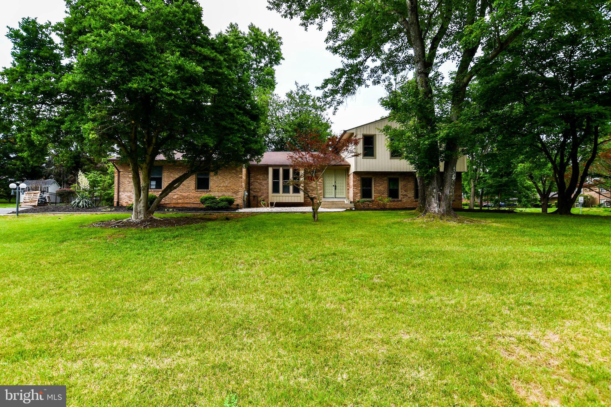 1423 Albert Drive Bowie, MD 20721 - Photo 2 of 86 a front view of a house with garden