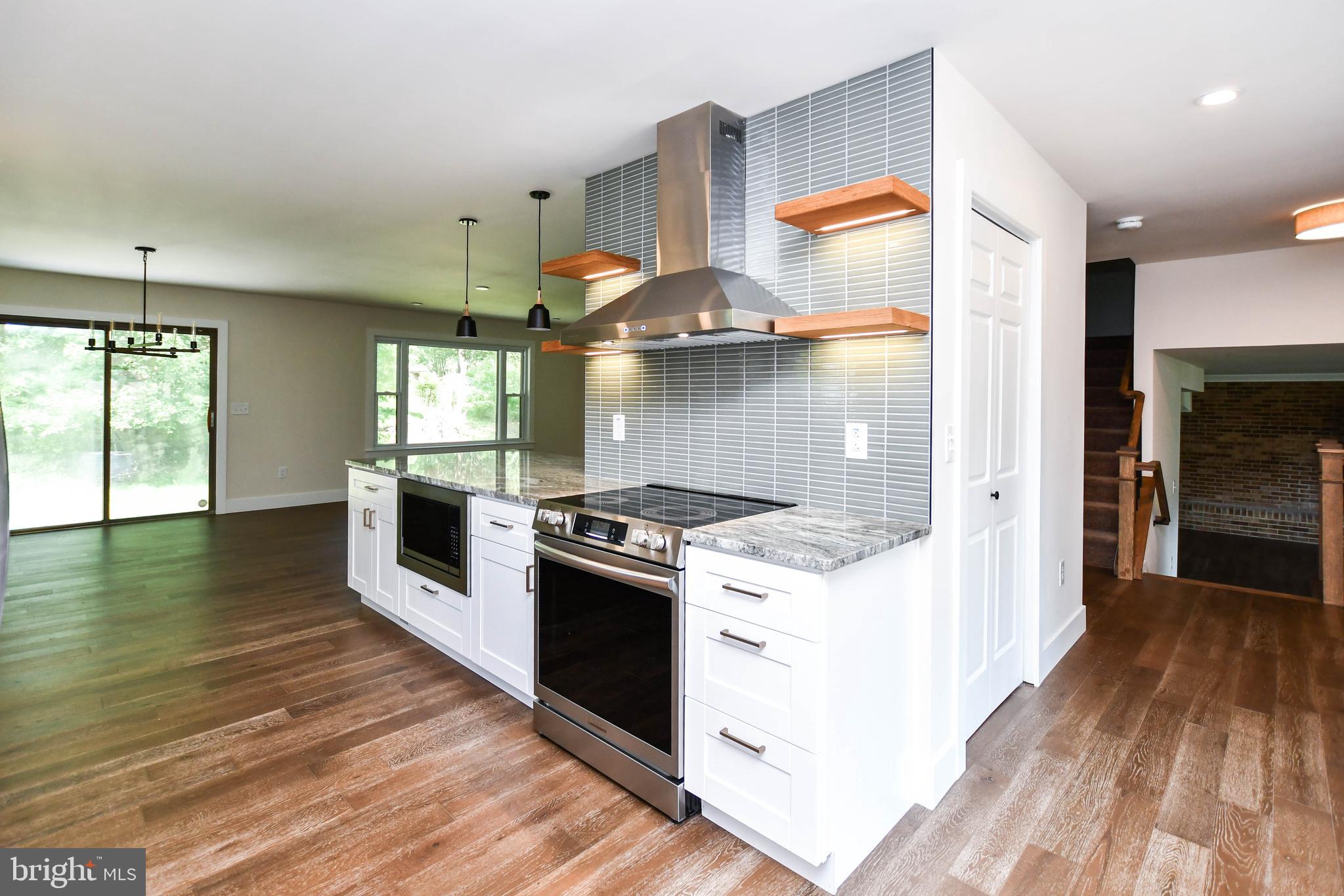 1423 Albert Drive Bowie, MD 20721 - Photo 24 of 86 a kitchen with a stove and wooden floor