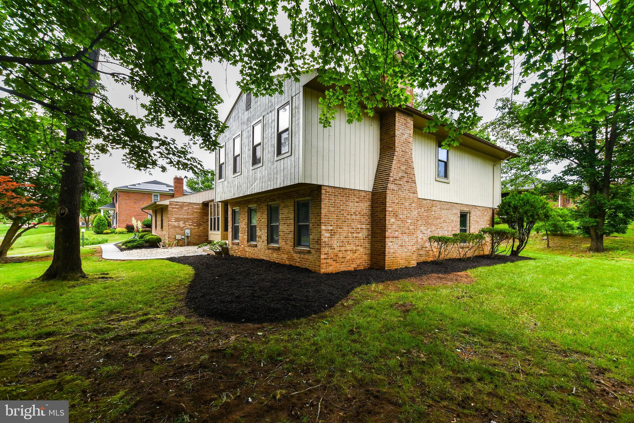 1423 Albert Drive Bowie, MD 20721 - Photo 4 of 86 a front view of house with yard and green space