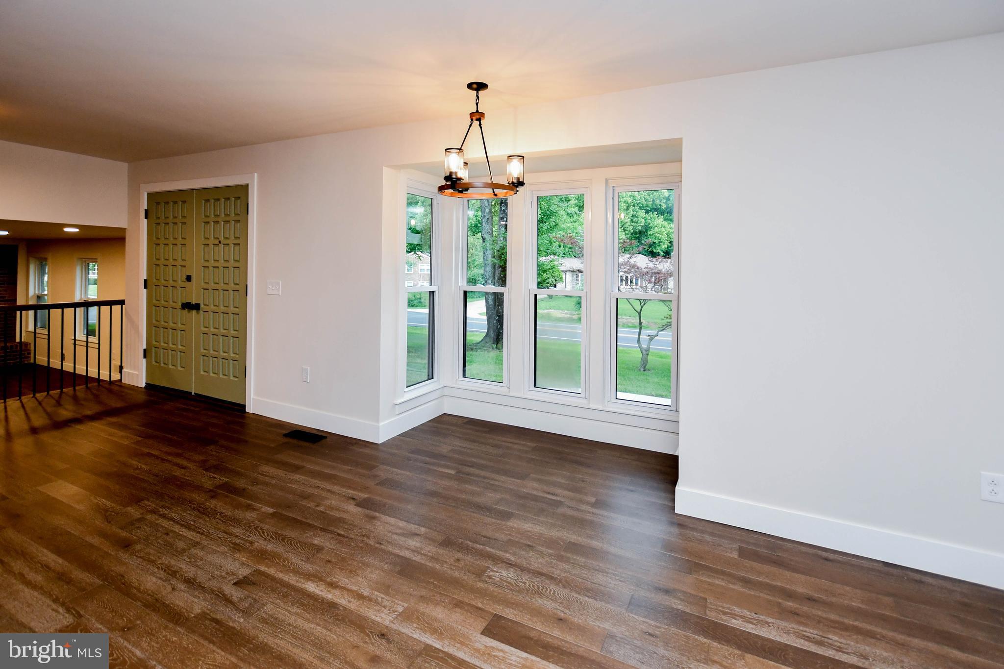 1423 Albert Drive Bowie, MD 20721 - Photo 41 of 86 a view of empty room with wooden floor and fan
