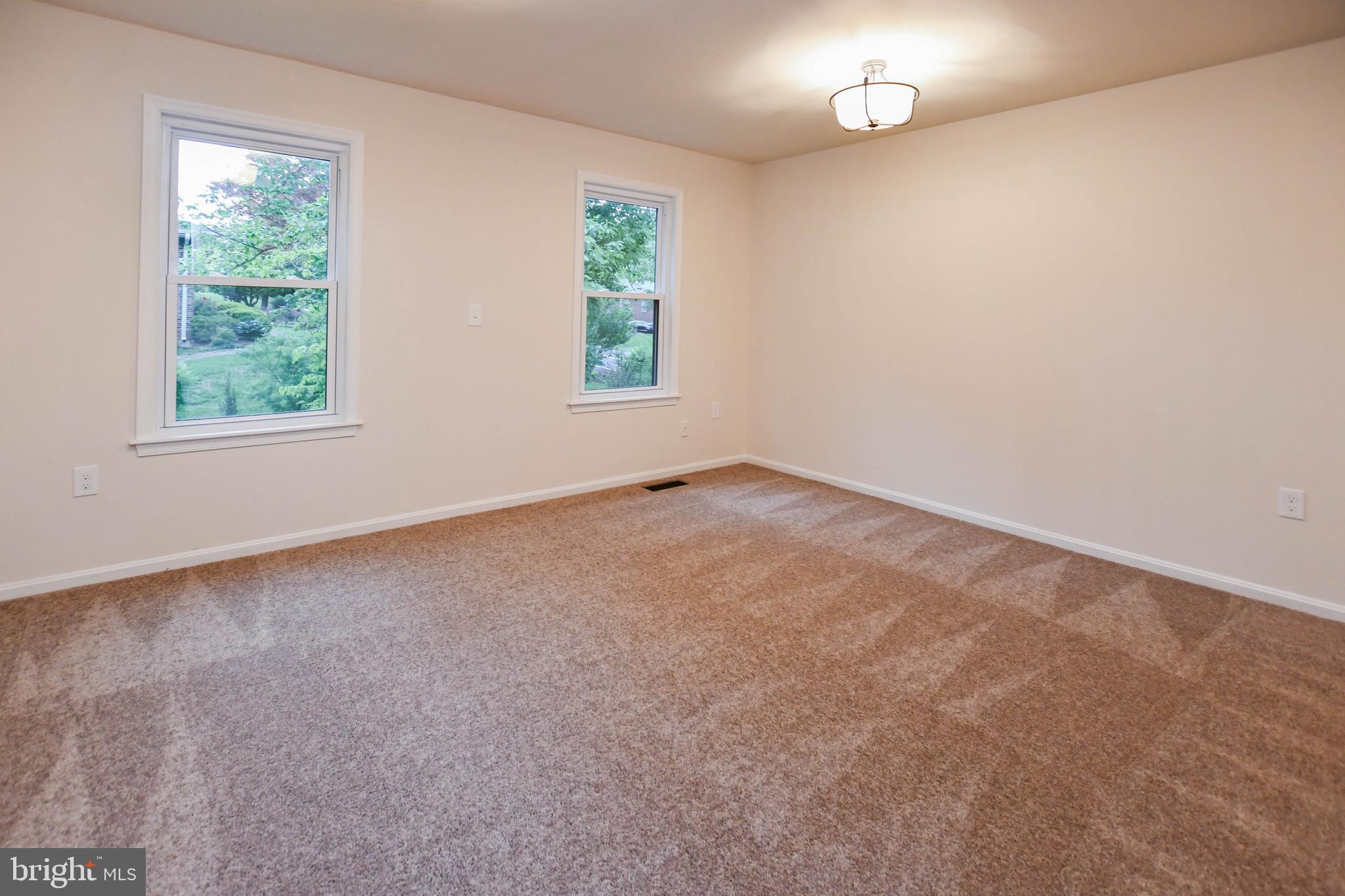1423 Albert Drive Bowie, MD 20721 - Photo 45 of 86 an empty room with windows and closet