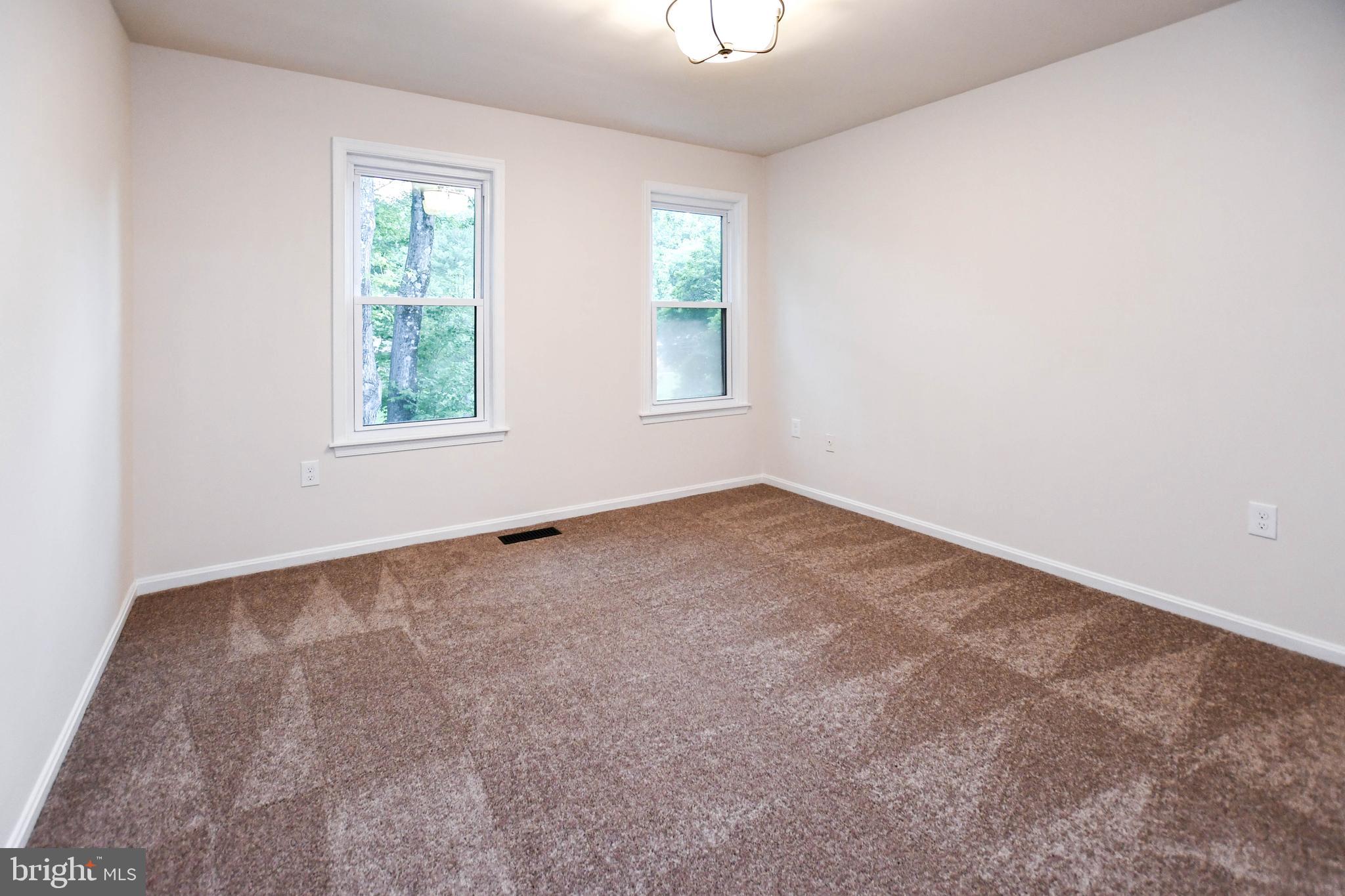 1423 Albert Drive Bowie, MD 20721 - Photo 59 of 86 an empty room with a window