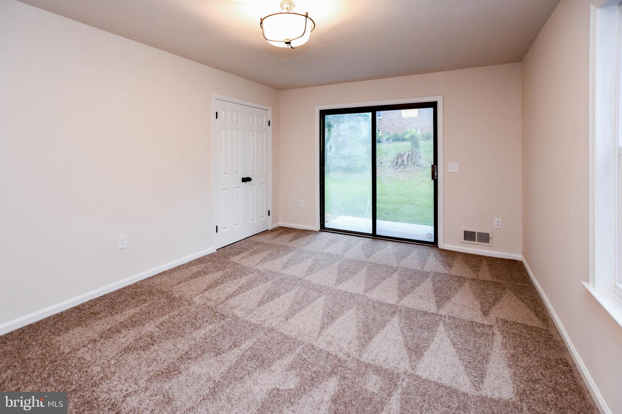 1423 Albert Drive Bowie, MD 20721 - Photo 75 of 86 a view of an empty room with a window