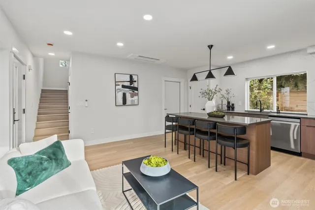 a living room with furniture and a table