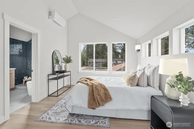 a bathroom with a sink vanity and mirror