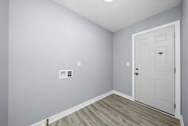 a view of small space with wooden floor