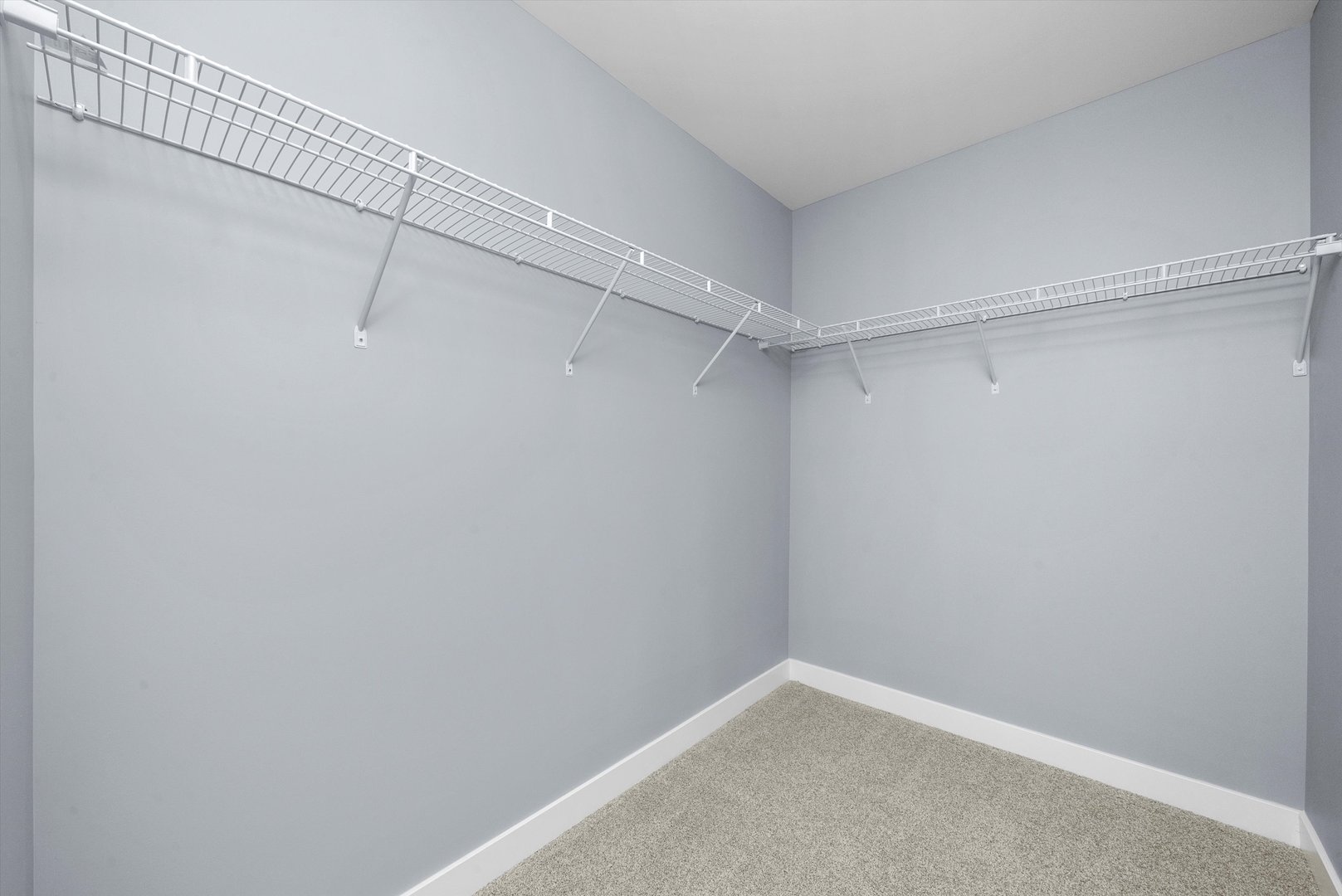 106 West Thompson Street Harvard, IL 60033 - Photo 23 of 46 a view of a room with racks on the wall