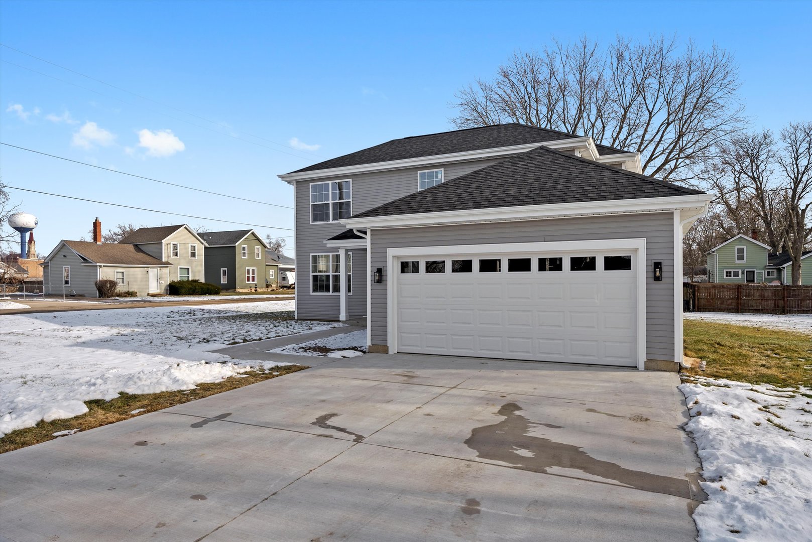 106 West Thompson Street Harvard, IL 60033 - Photo 37 of 46 a view of a house with a yard