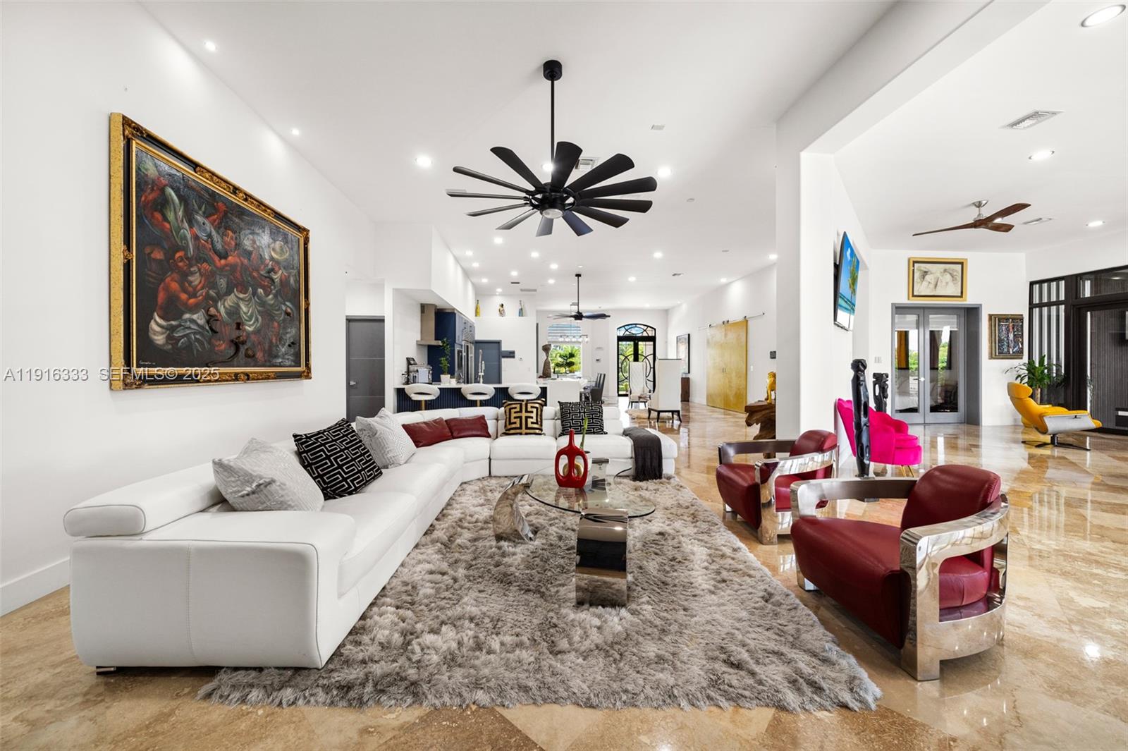 17490 Southwest 70th Place Southwest Ranches, FL 33331 - Photo 24 of 64 a living room with furniture and kitchen view