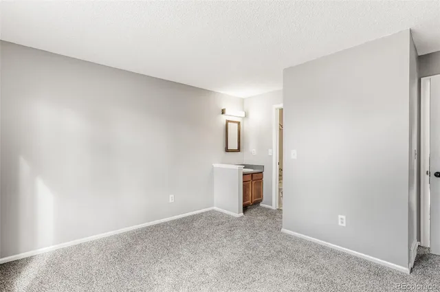 a view of a kitchen with a sink