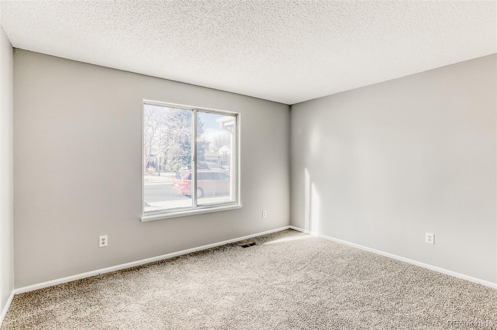 1912 Rice Street Longmont, CO 80501 - Photo 20 of 29 an empty room with a window