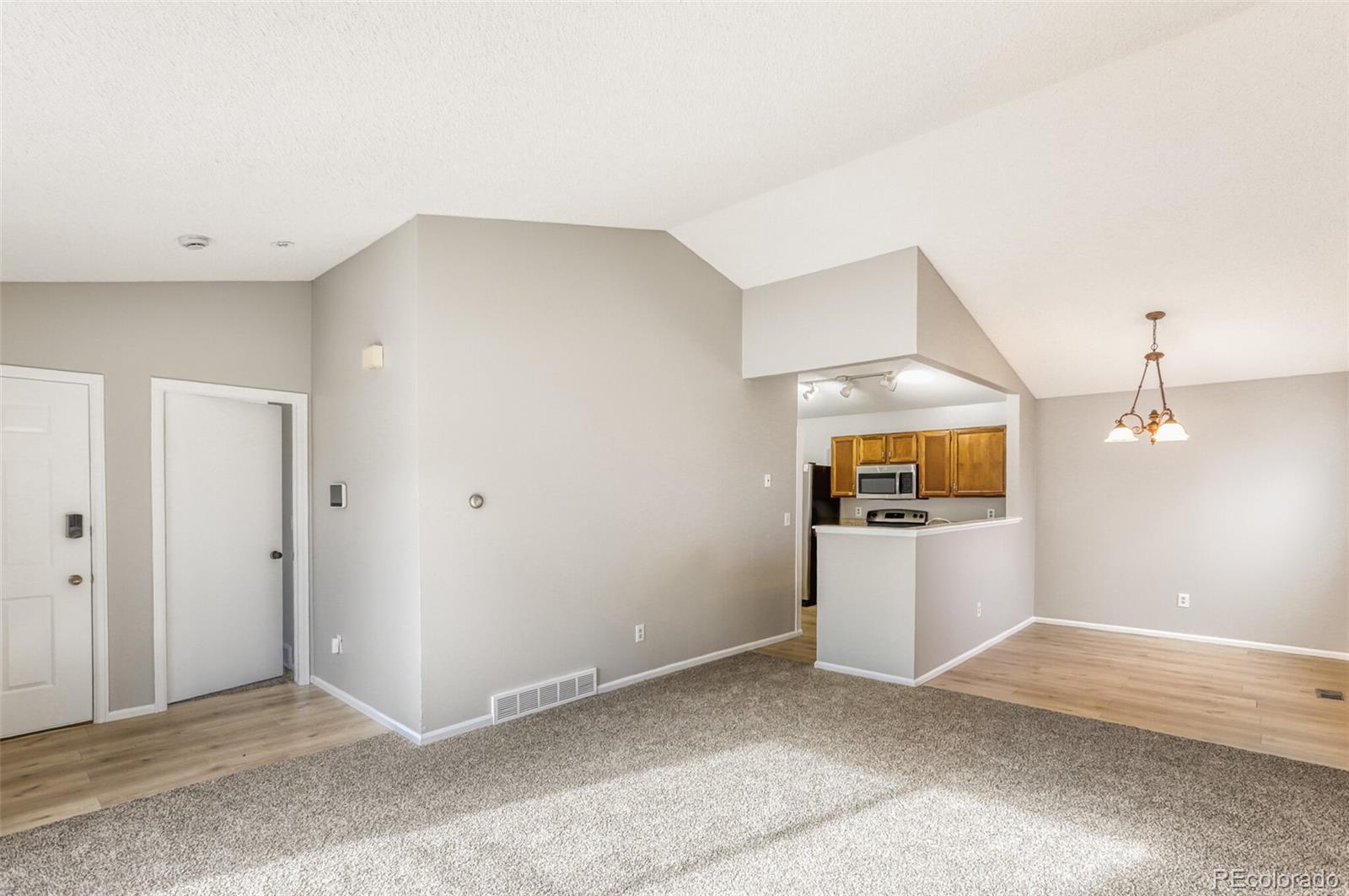 1912 Rice Street Longmont, CO 80501 - Photo 7 of 29 a view of a kitchen with a sink