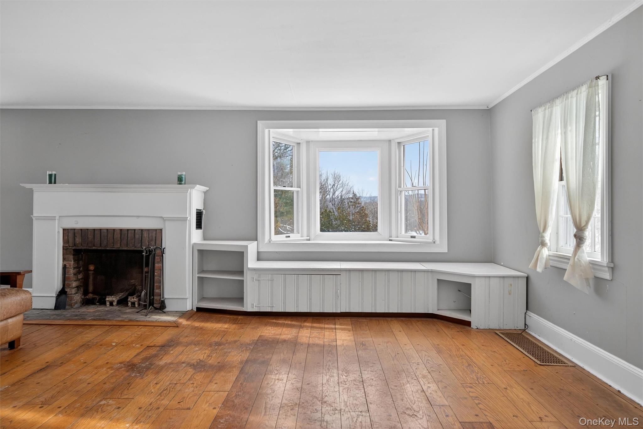 74 Onderdonk Road Warwick, NY 10990 - Photo 14 of 38 a view of an empty room with window and fire place