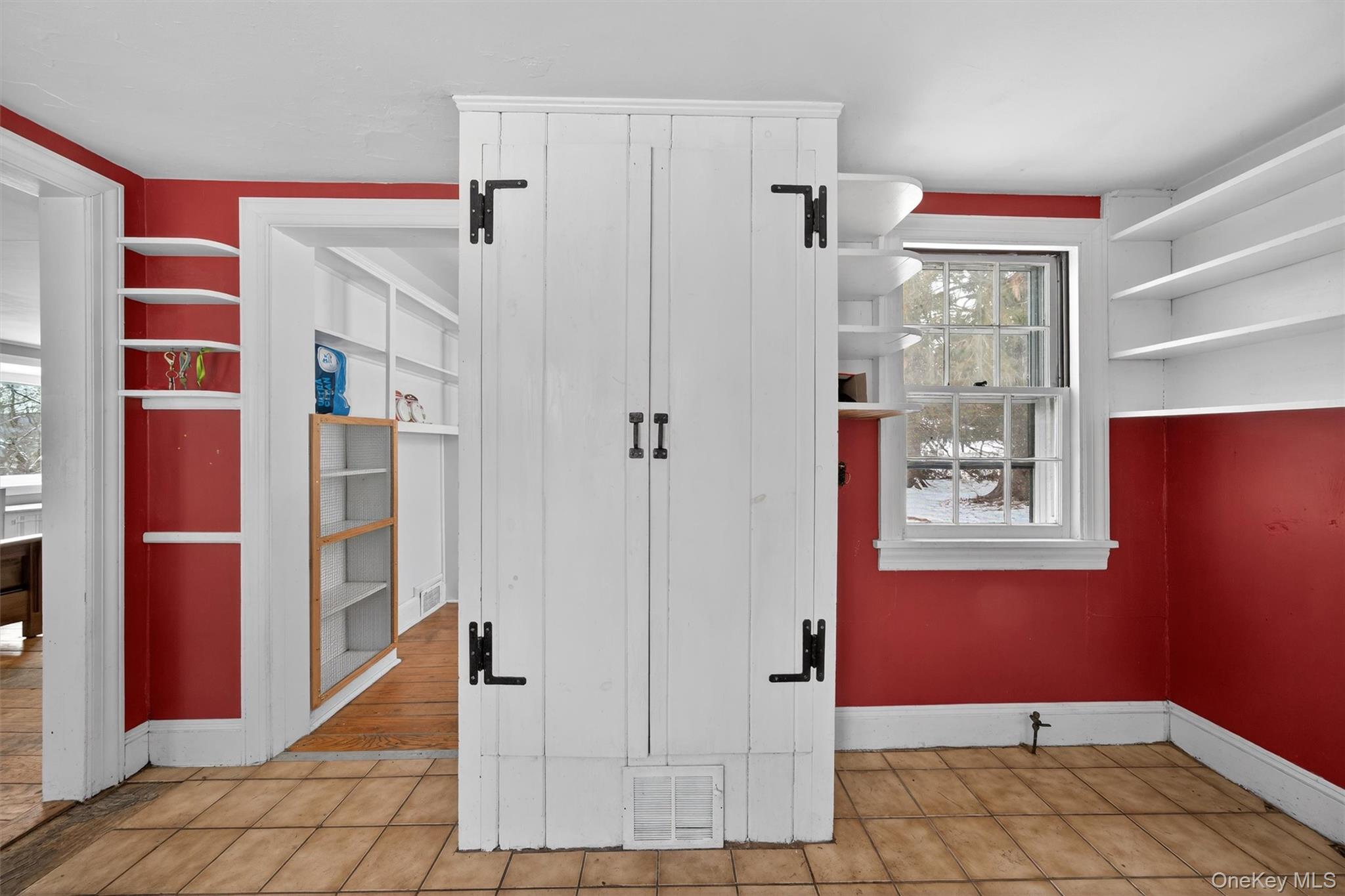 74 Onderdonk Road Warwick, NY 10990 - Photo 17 of 38 a view of an entryway with wooden floor and cabinet