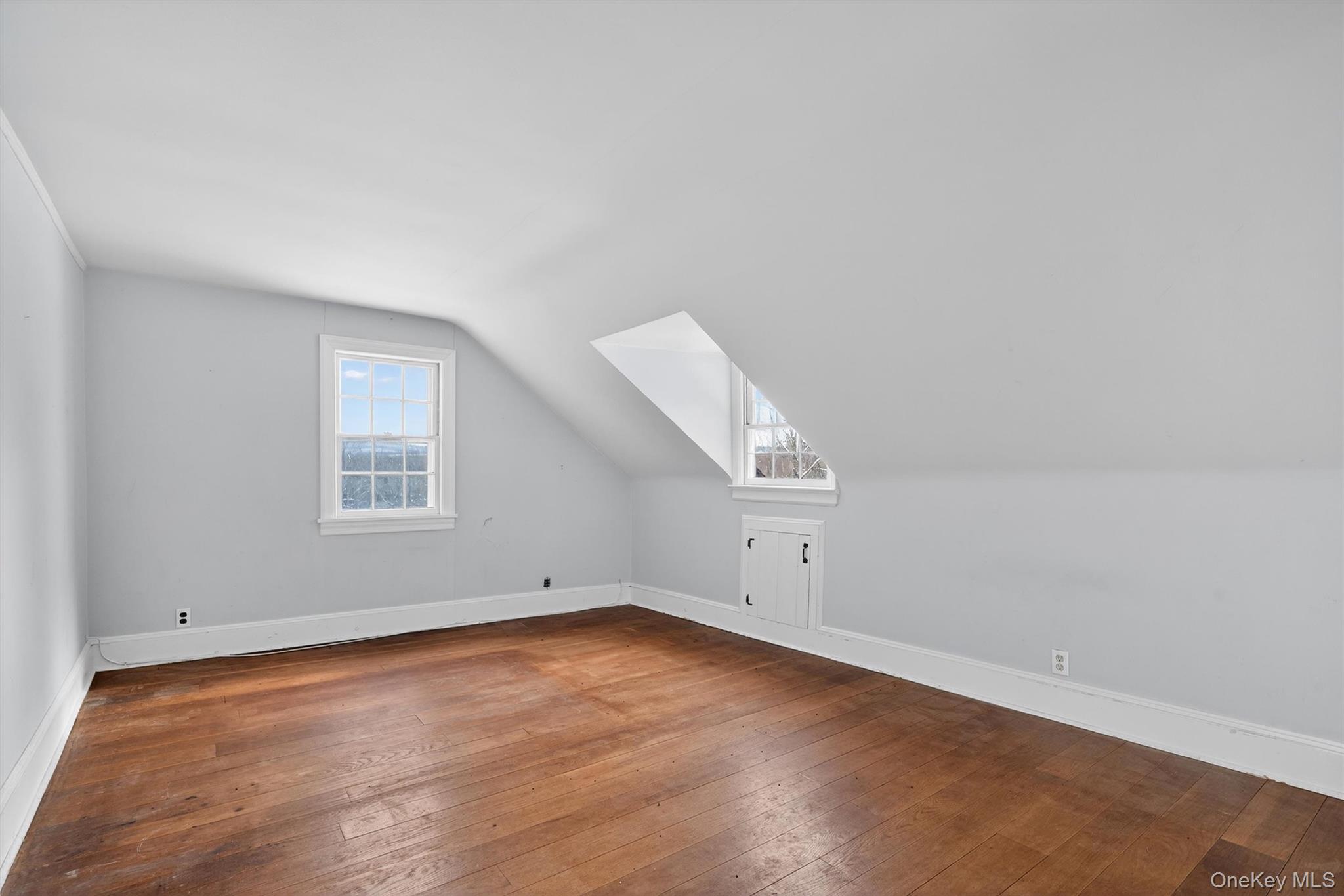 74 Onderdonk Road Warwick, NY 10990 - Photo 20 of 38 an empty room with wooden floor and windows