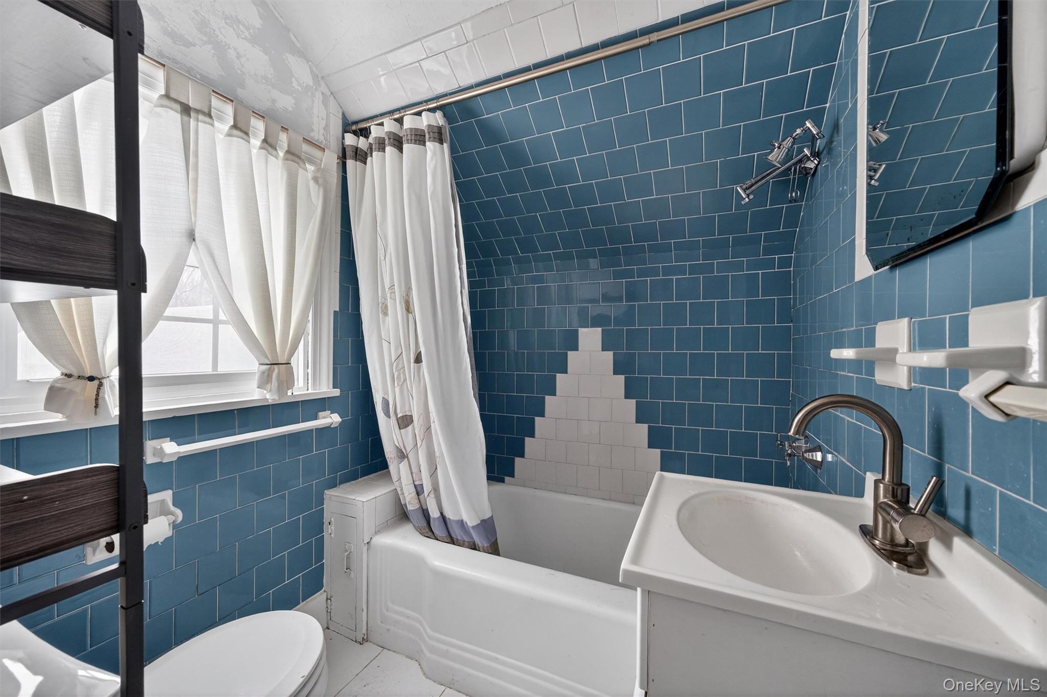 74 Onderdonk Road Warwick, NY 10990 - Photo 24 of 38 a bathroom with a sink toilet and shower