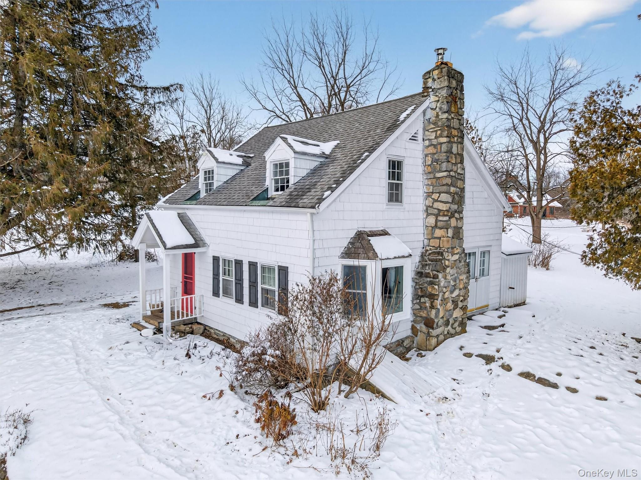 74 Onderdonk Road Warwick, NY 10990 - Photo 3 of 38 a view of a house with a yard covered in snow