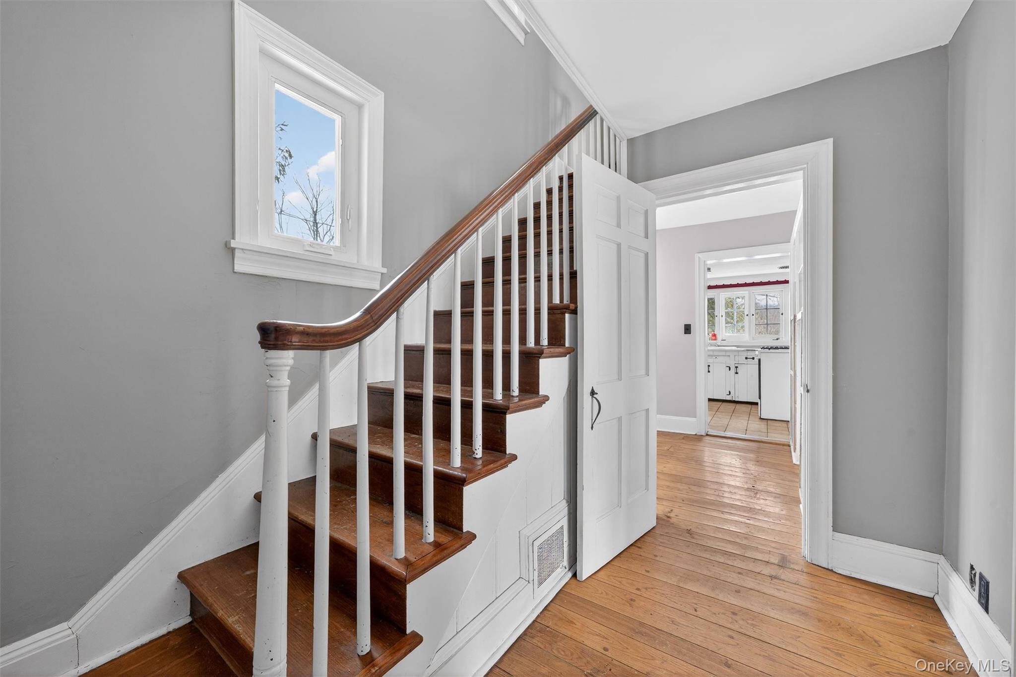 74 Onderdonk Road Warwick, NY 10990 - Photo 9 of 38 a view of staircase with wooden floor and white walls