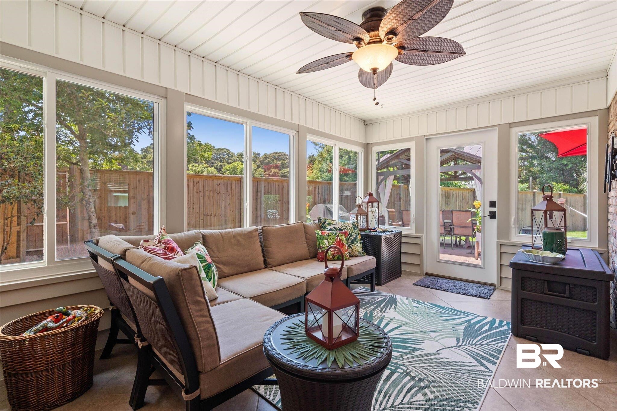 101 Ann Street Daphne, AL 36527 - Photo 23 of 38 Sunroom with a full wall of windows and an exterior door