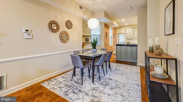 a view of a dining room with furniture