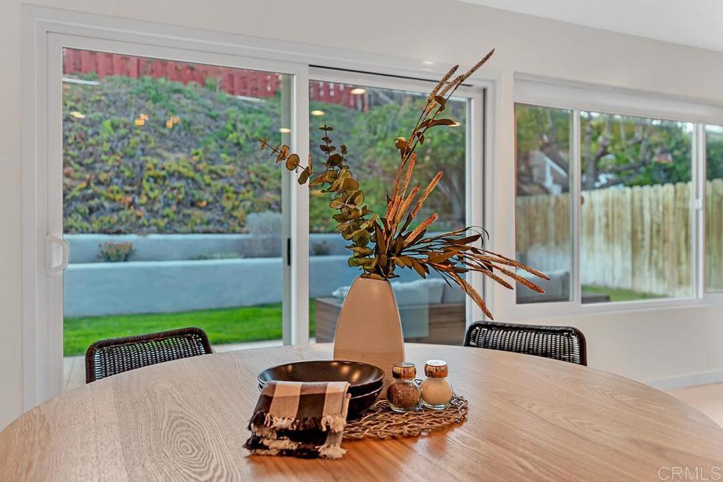 340 Trailview Road Encinitas, CA 92024 - Photo 14 of 35 a view of a porch with chairs and backyard