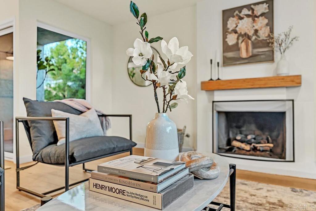 340 Trailview Road Encinitas, CA 92024 - Photo 7 of 35 a living room with furniture and a fireplace