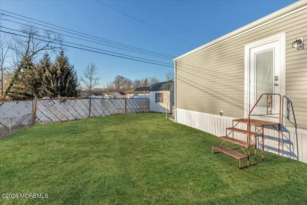 a view of a backyard with a garden