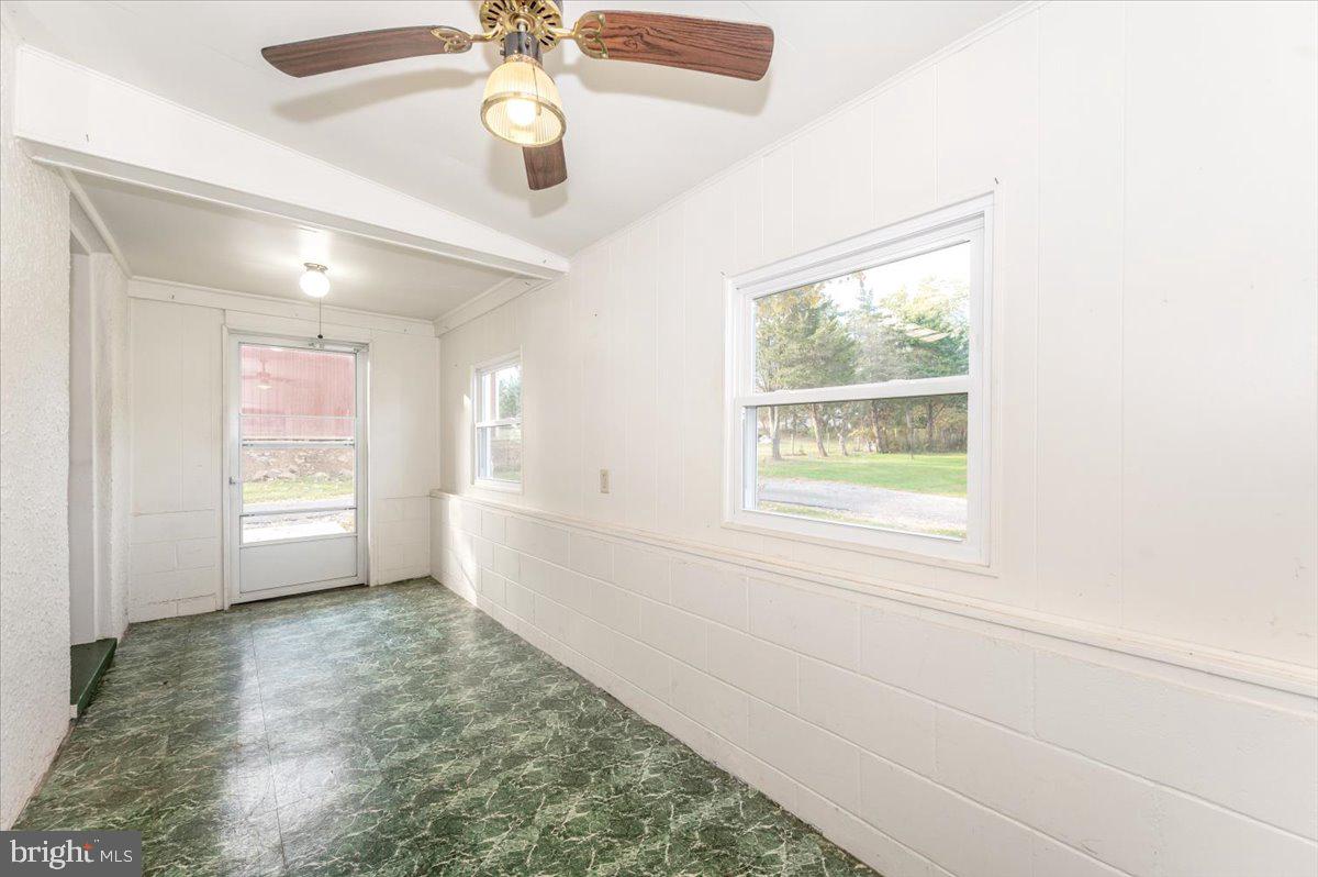 12514 Creagerstown Road Thurmont, MD 21788 - Photo 19 of 57 a view of an empty room with a window