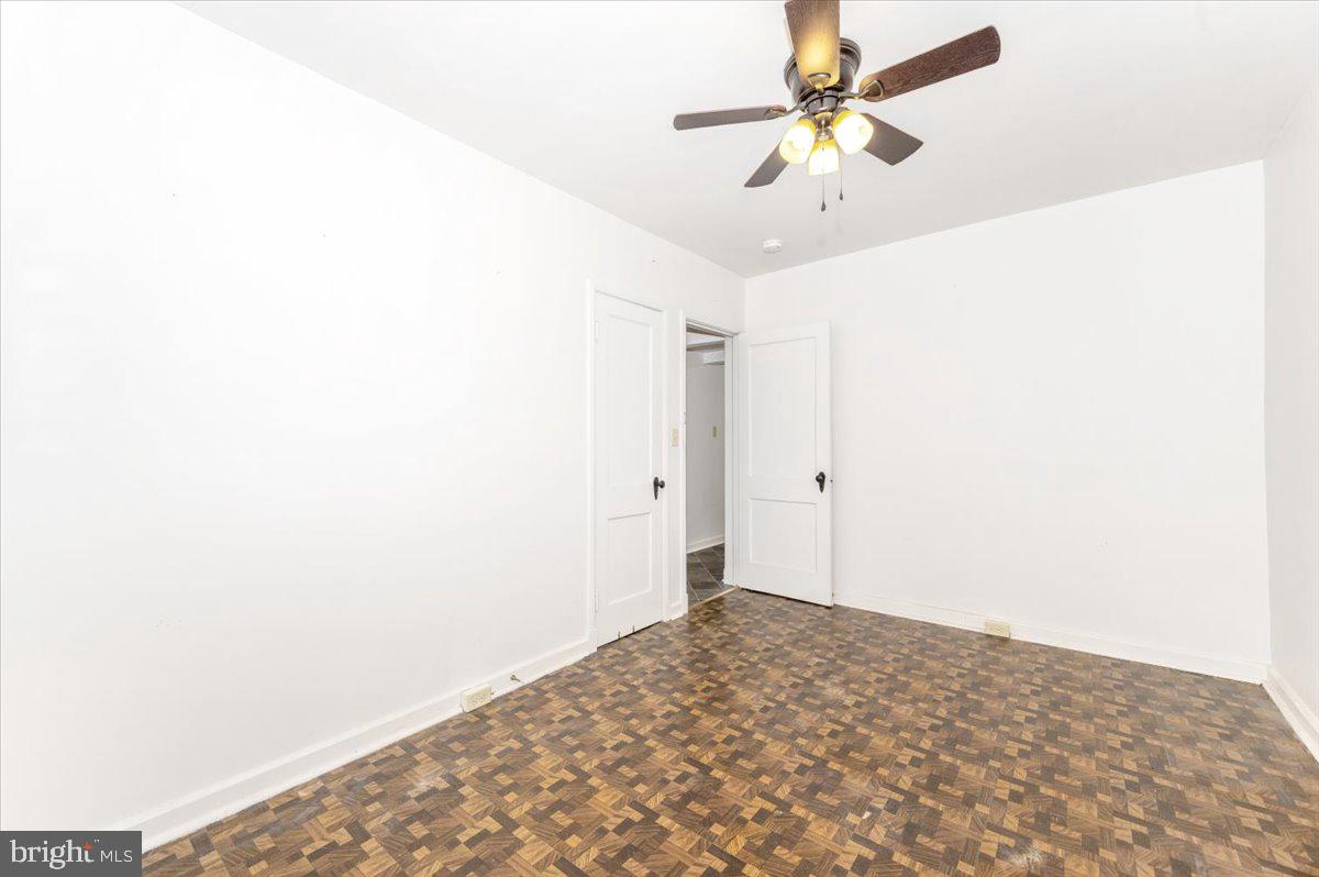 12514 Creagerstown Road Thurmont, MD 21788 - Photo 21 of 57 a view of a big room with a chandelier fan and closet