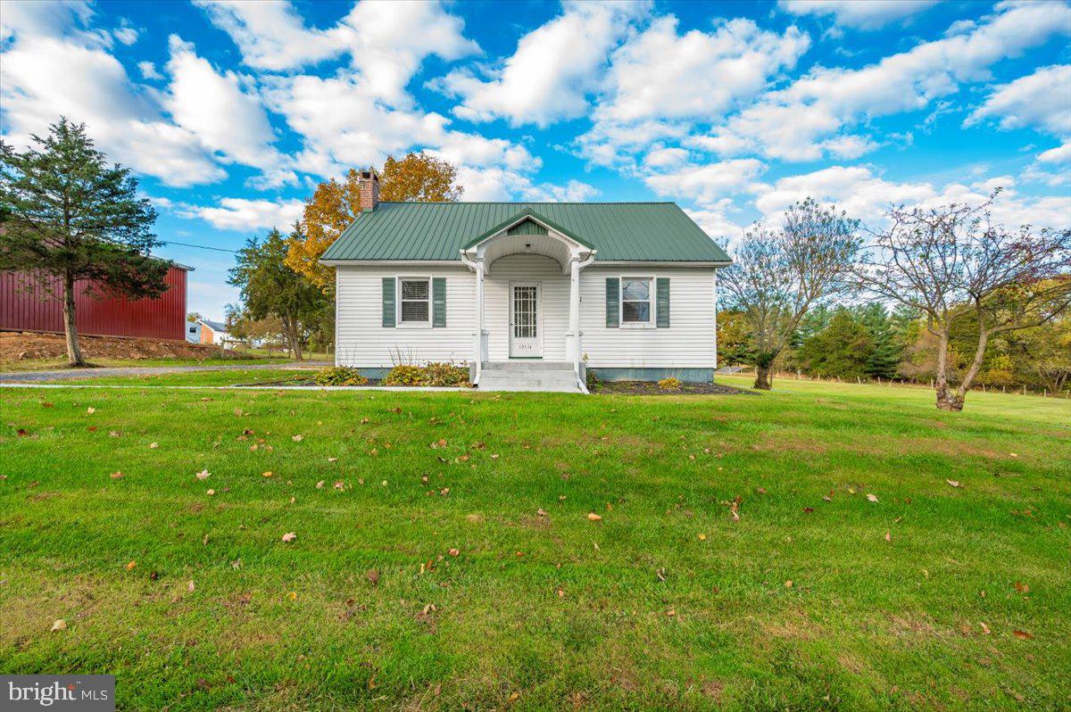 12514 Creagerstown Road Thurmont, MD 21788 - Photo 55 of 57 a front view of house with yard and green space