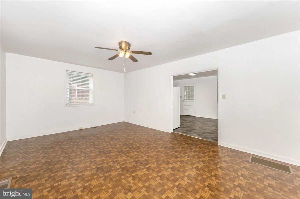12514 Creagerstown Road Thurmont, MD 21788 - Photo 6 of 57 a view of an empty room with a window