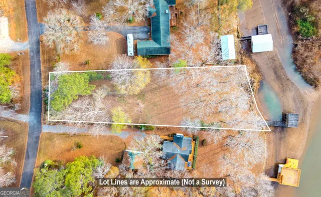 a kitchen with a sink stove and refrigerator
