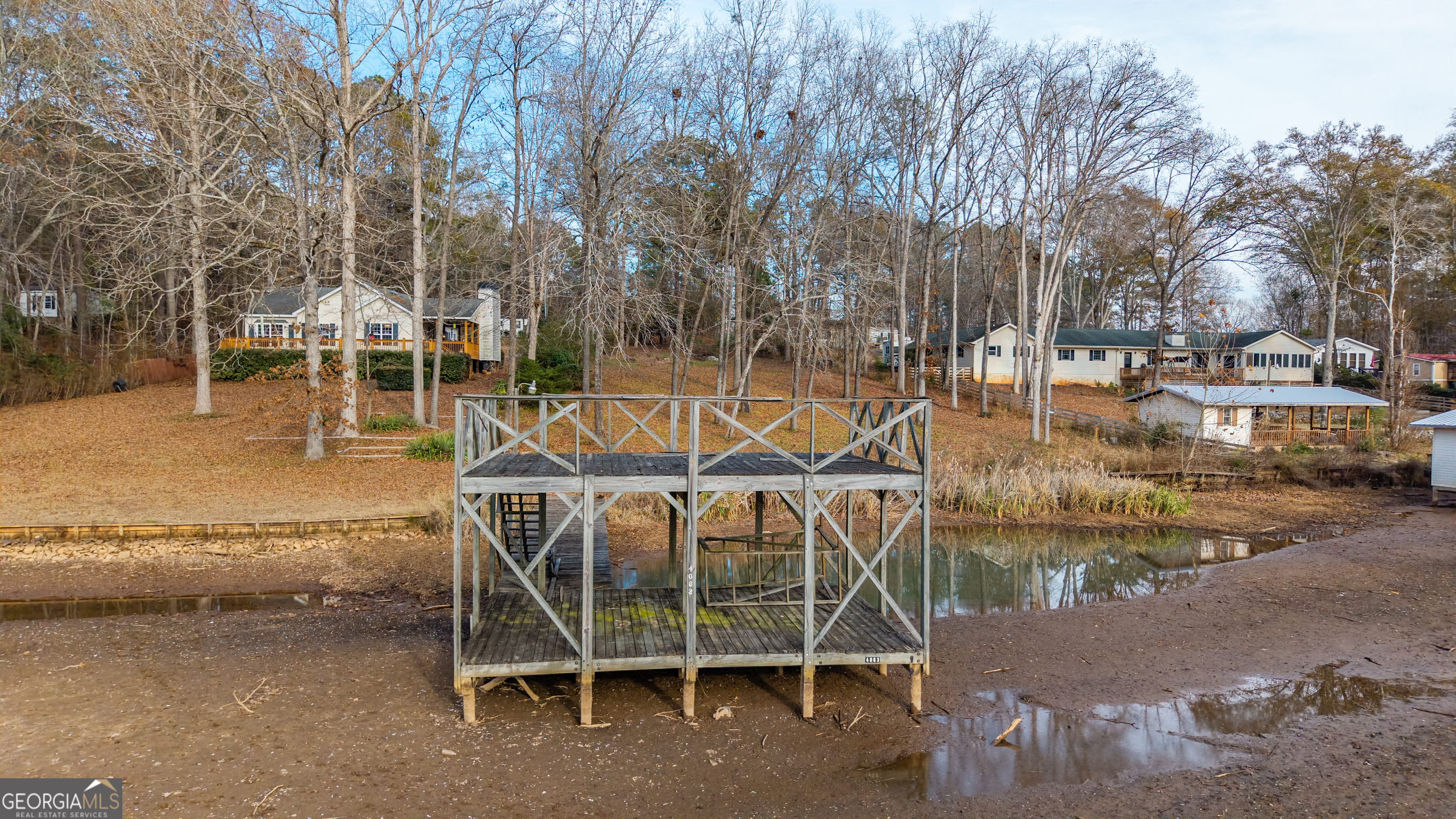 128 Sunset Drive Eatonton, GA 31024 - Photo 10 of 16 a view of a swimming pool with a lounge chairs