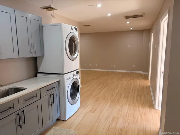 a storage room with washer and dryer