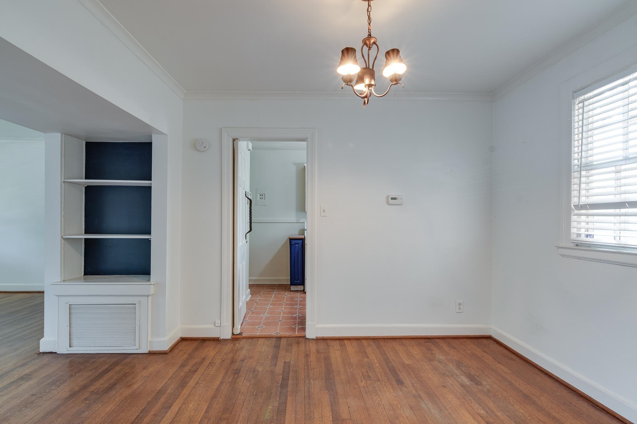 1885 Peabody Avenue, Unit 3 Memphis, TN 38104 - Photo 8 of 30 a view of livingroom with hardwood floor and window