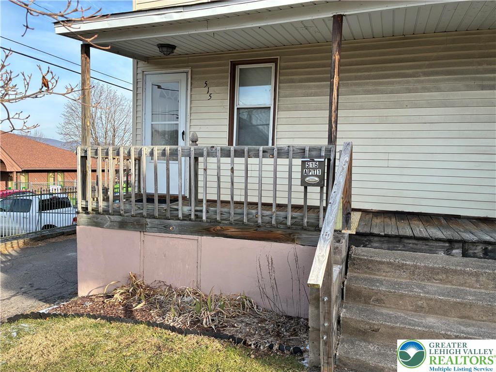 515 Breck Street, Unit 1 Scranton, PA 18505 - Photo 1 of 5 a view of a porch with a chair