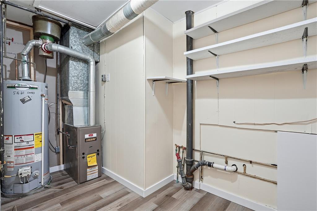 805 Colonial Avenue Monaca, PA 15061 - Photo 16 of 30 a view of walk in closet with clothes and shoes