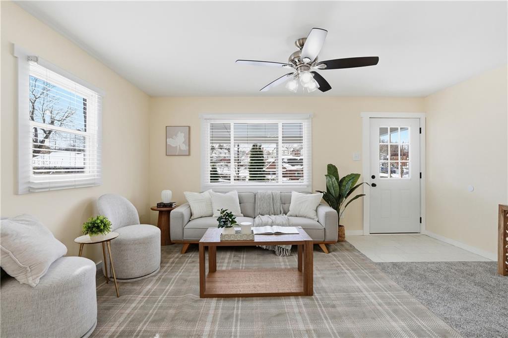 805 Colonial Avenue Monaca, PA 15061 - Photo 7 of 30 a living room with furniture and a large window