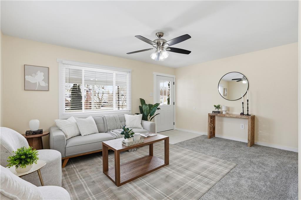 805 Colonial Avenue Monaca, PA 15061 - Photo 8 of 30 a living room with furniture and a large window