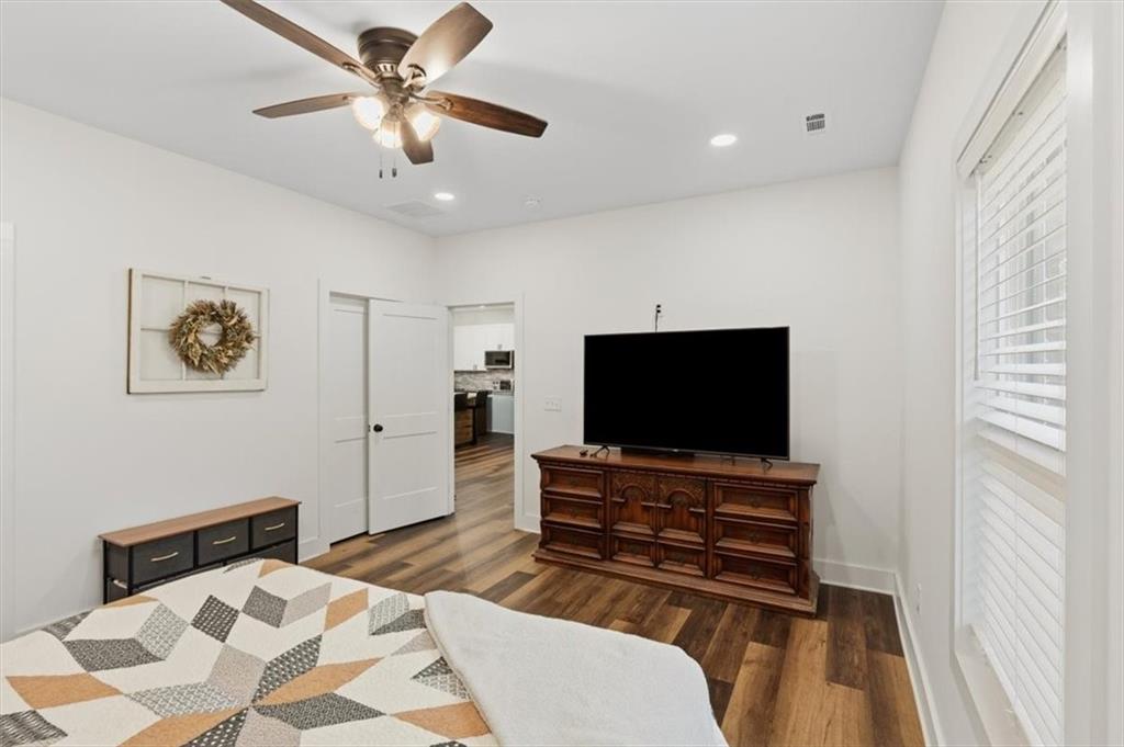 1475 Ben Davis Road Buchanan, GA 30113 - Photo 18 of 61 a bedroom with a bed and a flat screen tv