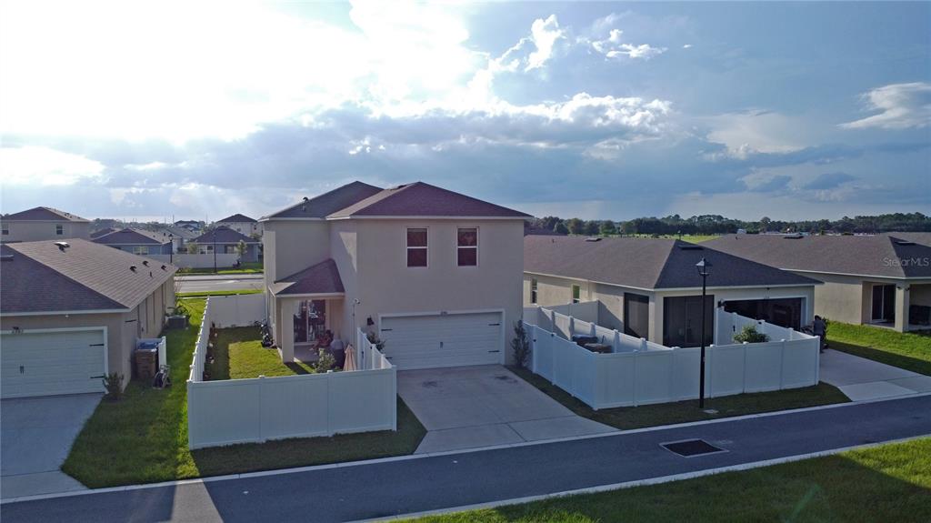 6988 Botanic Boulevard Harmony, FL 34773 - Photo 41 of 61 an aerial view of a house