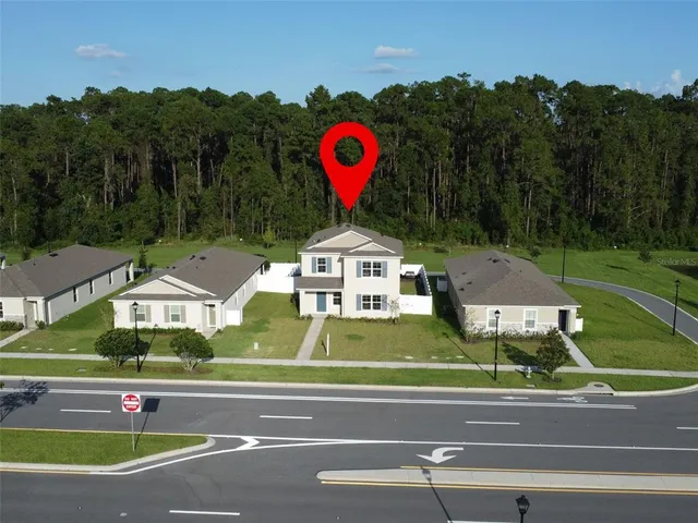 a lobby with furniture and rug