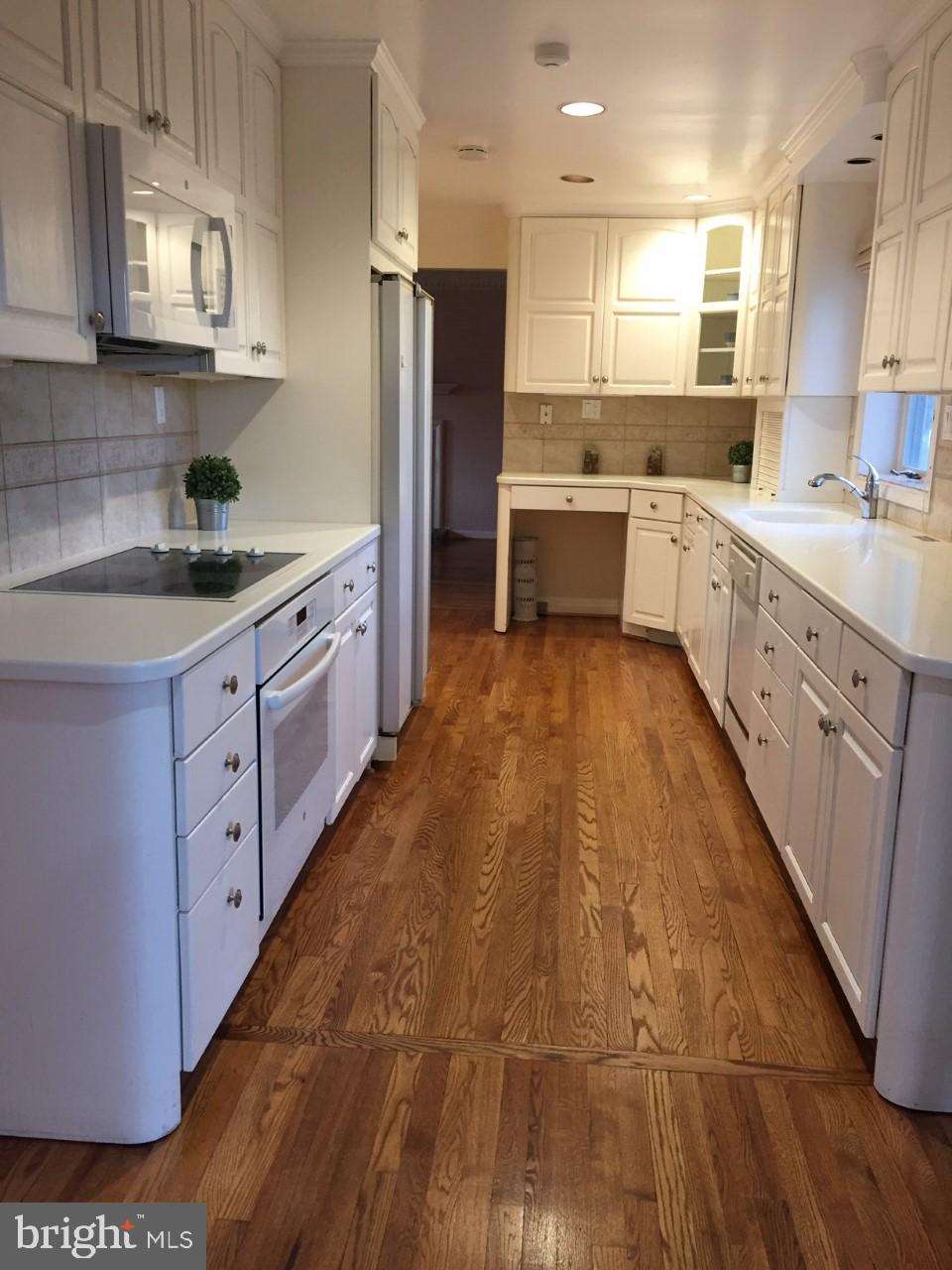 12625 Billington Road Silver Spring, MD 20904 - Photo 8 of 29 Kitchen with freshly refinished hardwood floors