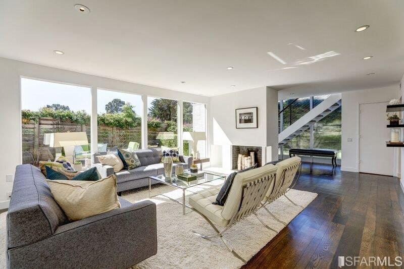 219 Ricardo Road Mill Valley, CA 94941 - Photo 5 of 31 Expansive living room with exceptional light, newly refinished HW floors, fireplace and recessed lighting.
