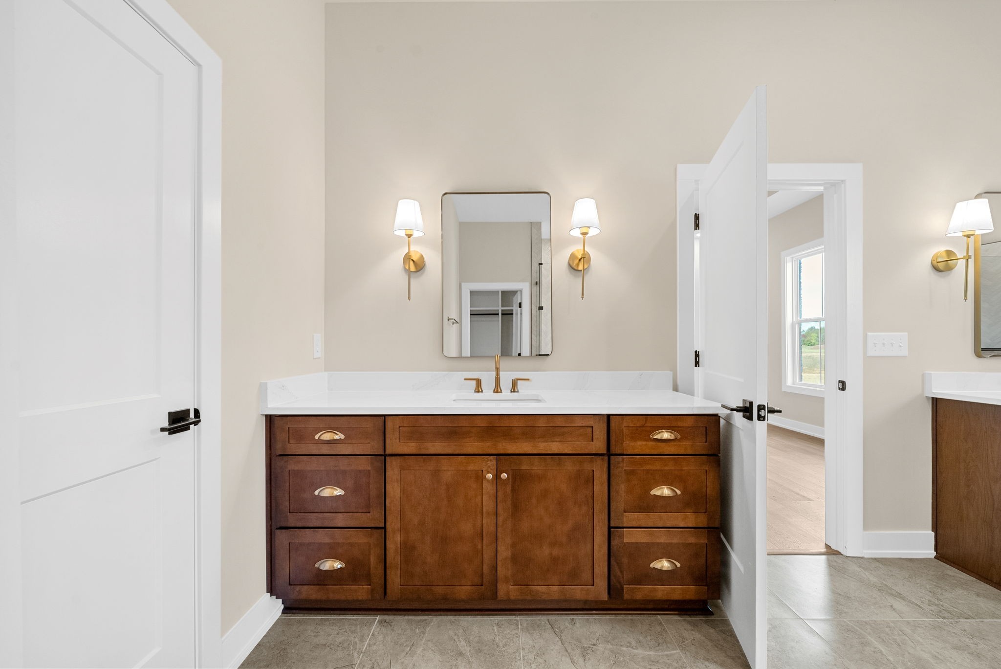 3712 Budds Creek Road Palmyra, TN 37142 - Photo 22 of 100 a spacious bathroom with a sink and a mirror
