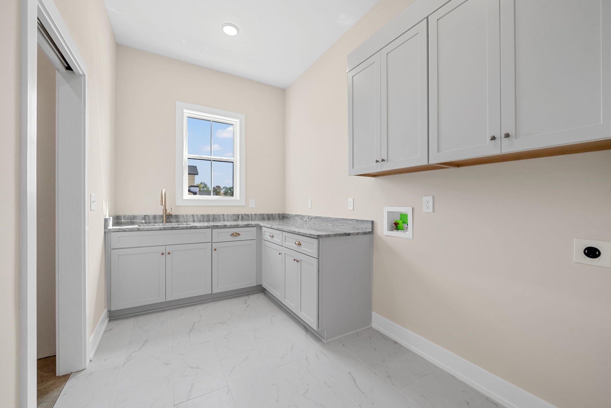 3712 Budds Creek Road Palmyra, TN 37142 - Photo 27 of 100 a kitchen with granite countertop white cabinets and white appliances