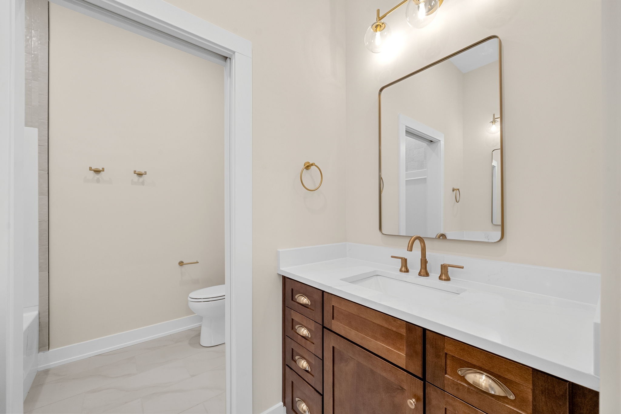 3712 Budds Creek Road Palmyra, TN 37142 - Photo 31 of 100 a bathroom with a sink a toilet and a mirror