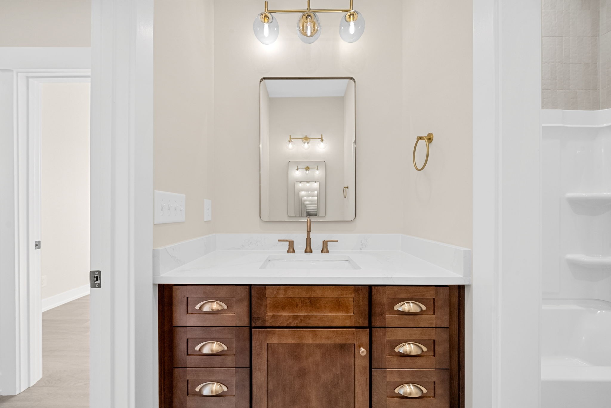 3712 Budds Creek Road Palmyra, TN 37142 - Photo 33 of 100 a bathroom with a sink and a mirror