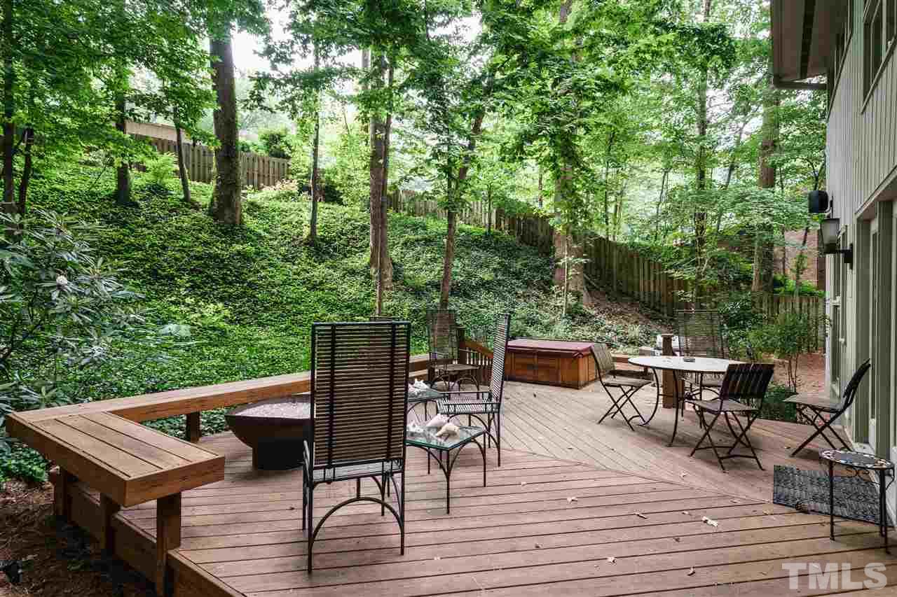 3606 Swann Street Raleigh, NC 27612 - Photo 22 of 25 Firepit has a permanent gas line and the sellers consider it a fixture for the next owners to enjoy.